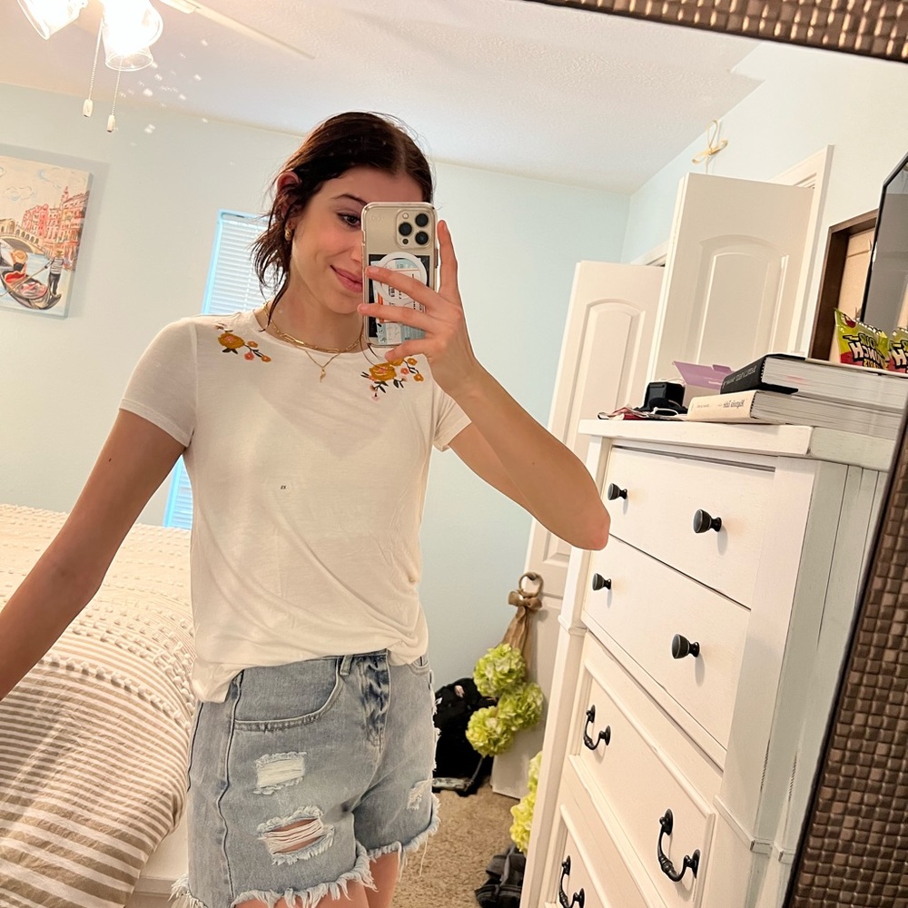 NEW WITH TAGS! white tee with floral stitching around the neck